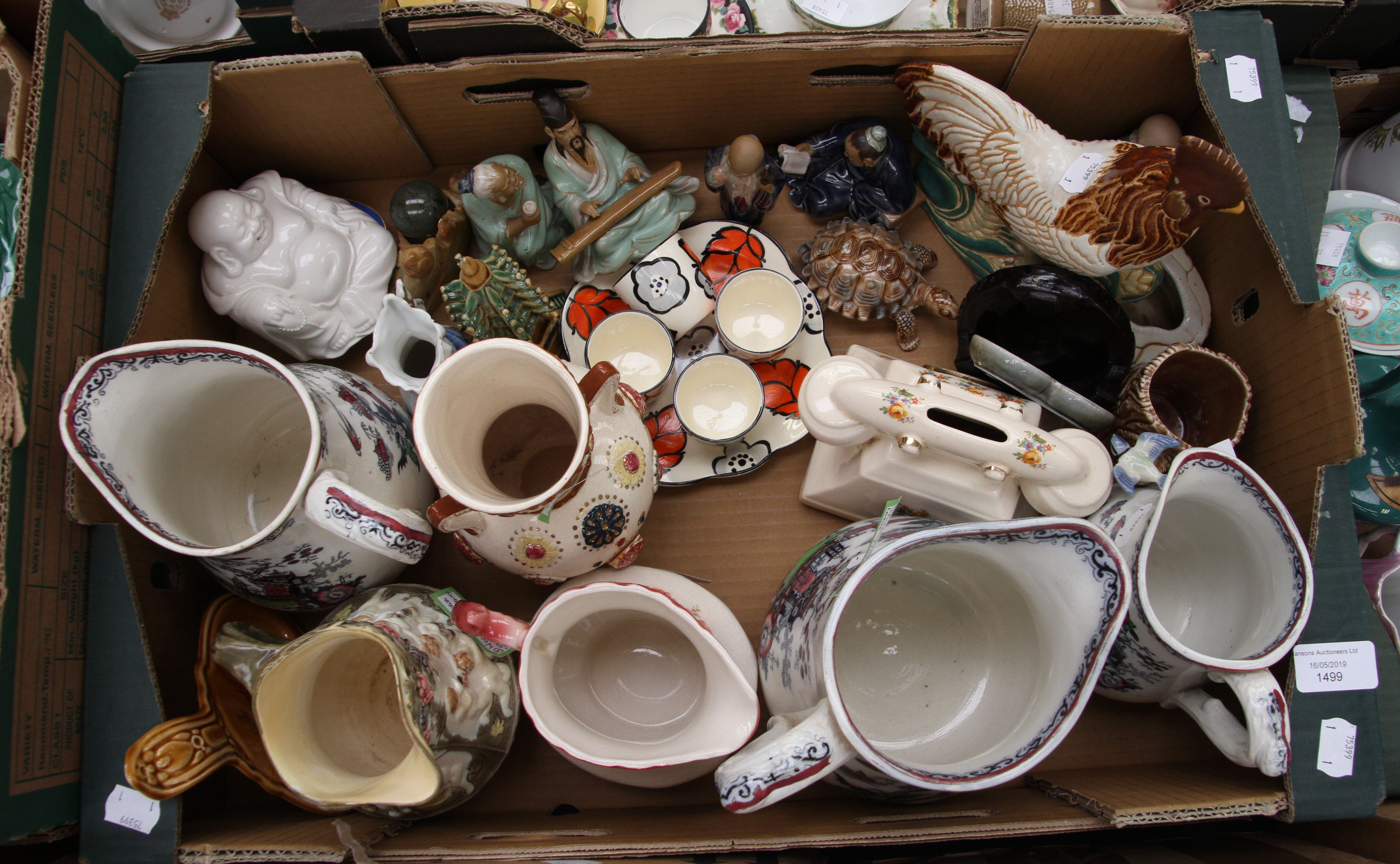 Assorted ceramic pieces including Ironstone and Rockingham jugs,