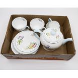 A Shelley Wild Flowers tea set for two, comprising teapot, two cups, two saucers, two side plates,