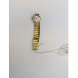 A ladies Everite 9ct wristwatch, with gold bracelet, total gross weight approx 15.