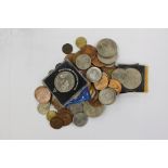 A collection of various nickel/silver coins, pennies, commemorative coins,