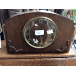 An A.W.Marston, circa 1950's veneered mantle clock, Arabic numerals, complete with key.