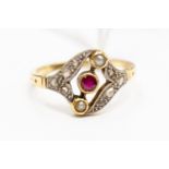 An Edwardian ruby seed pearl and diamond set 18 ct gold ring