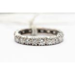 A diamond 18ct white gold full eternity ring,