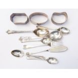 A collection of assorted silverware, comprising two teaspoons, four coffee spoons, cake fork,