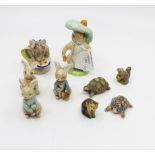 Collection of Beatrix Potter figurines including Royal Albert,