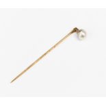 A cultured pearl stick pin, pearl approx 7mm, unmarked yellow metal probably 9ct gold,