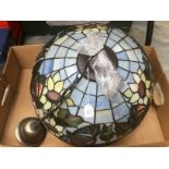 A Tiffany style coloured glass and metal large ceiling lamp shade