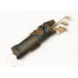 Golf Interest: an early 20th Century possibly American novelty leather miniature golf club bag with