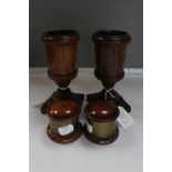 A pair of turned treen spill holder, early 20th Century, square plinths, height 16cm,