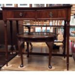 A Beven Funnell mahogany two drawer side table of concave form,