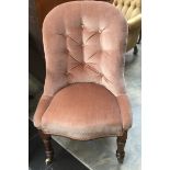 A mid Victorian mahogany dusky pink ladies upholstered chair, with deep buttoned back,
