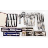 A collection of stainless steel cutlery, Kings pattern, including knives, forks, dessert spoons,