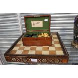 A Tunbridge Ware chess board with ivory and wood chequer board,