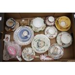 A tea set; contents to include assorted bone china tea cups Wedgwood Jasperware plates,