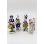 Four 19th Century continental porcelain figures some with anchor marks,