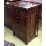 A contemporary mahogany four drawer bedside chest,