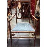 An Edwardian Sheraton style mahogany open armchair, inlaid back,