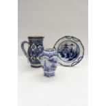 A collection of Delftware including 18th Century style polychrome plate decorated with Chinese