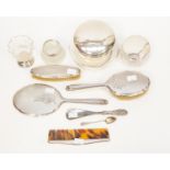 A group of dressing table silver to include powder jars,