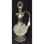 A Waterford cut glass claret jug, of pedestal form, the body with hobnail cut decoration,