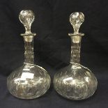 A pair of Victorian cut glass decanters and stoppers