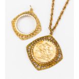 A 1911 George V gold sovereign in 9ct gold pendant mount,