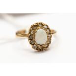 An opal and white stone set cluster ring, 9ct gold, size I1/2, total gross weight approx 2.