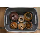 Four earthenware part glazed jugs,