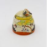 Clarice Cliff for Wilkinson, a small Tulips beehive honey pot, Bizarre mark, 7.