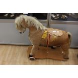 German sit-on horse on wheels