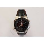 A gentleman's Seiko Sportura wristwatch, black dial,
