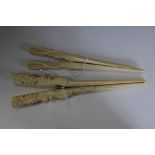 Two pairs of 19th century ivory glove stretchers,
