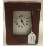 19th Century French carriage clock with enamelled dial in original leather carrying case and key