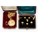 A pair of rose metal ball and torpedo foliate engraved cuff links,