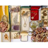 A bag of vintage ladies and gents costume jewellery including silver