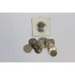 A group of silver milled coins to include a George III 1s 6d bank token and coins of William III,