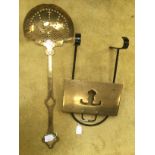 Brass and iron slider and a brass nut roaster etc (2)