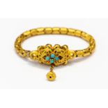 A Victorian serpent bracelet, turquoise stones set to the head set in yellow metal,
