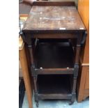 A mid 20th Century oak tea trolley, of three tier form,