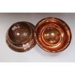 A pair of 19th Century copper spittoons from a public house
