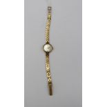 A ladies 9ct gold bracelet watch Trebex, diameter approx 16 mm, total gross weight approx 16.