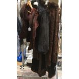 A collection of fur to include; a 1930's velvet cape and hood lined with squirrel;