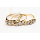 Three diamond and 18ct gold rings, comprising two three stone set rings,