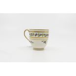 A Derby porcelain 98 pattern coffee cup, circa 1790, Chantilly sprig and band, puce mark,