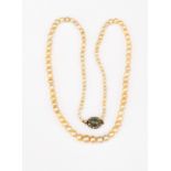 A Victorian single row pearl necklace with crysoberyl and diamond clasp,