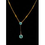 A blue stone pendant drop necklace, possibly blue zircon,