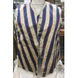 A Victorian gentleman's silk waistcoat from 1840/55 in cream and deep blue striped silk,