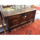 A late 17th century oak coffer, three panelled.