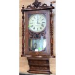 A late 19th Century salon wall clock in-layed Roman numerals,