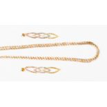 A suite of 9ct three colour gold jewellery comprising a chevron link necklace and a pair of